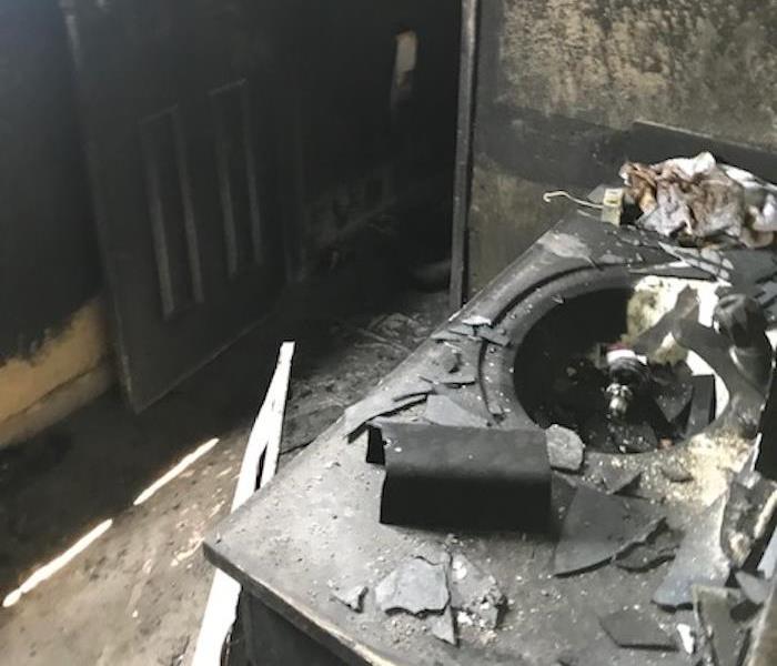 Bathroom with significant fire damage