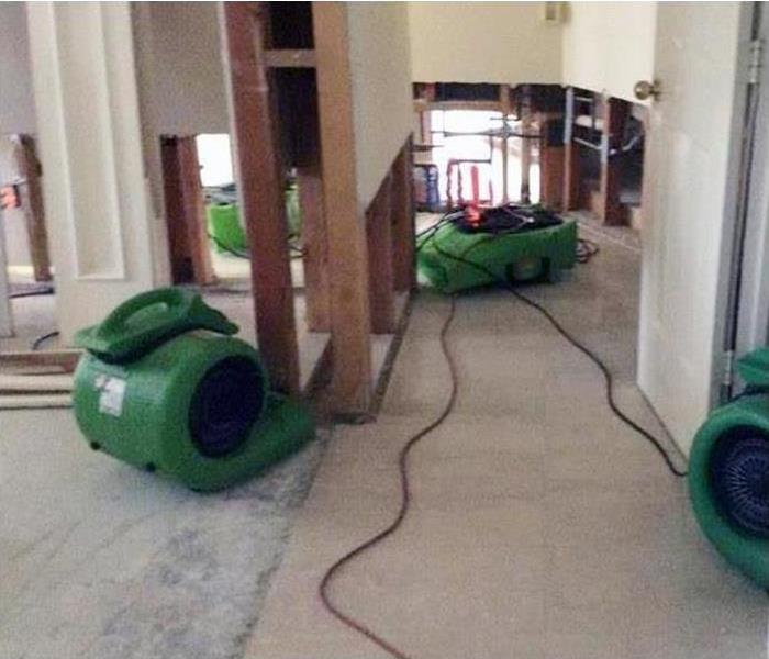 Three of our green machines drying the flood damage in this property